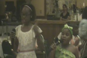 Kids performing a song.